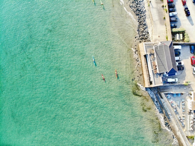 UK paddleboarding holiday drone shot