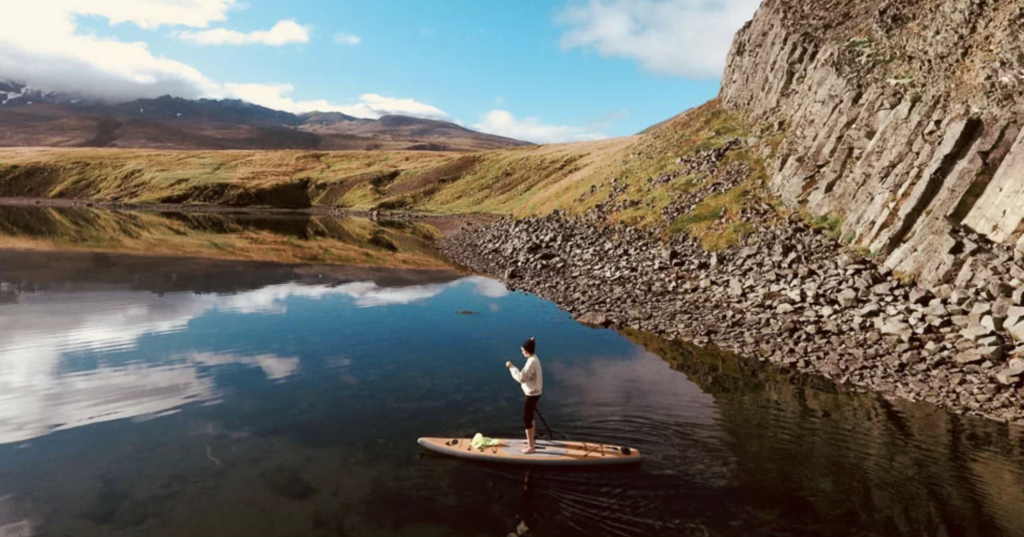 loch and paddleboarder